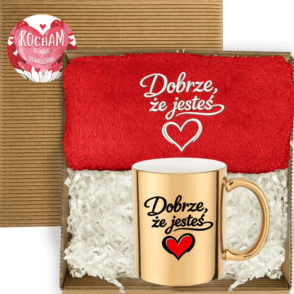 Otwarty box z ręcznikiem z haftem i złotym kubkiem 330 ml z napisem